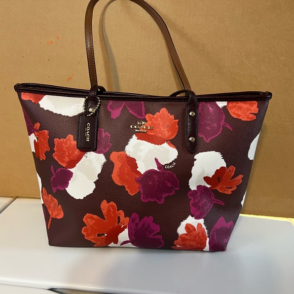 Coach Handbags - Coach Burgundy Floral Print Leather Tote with Multi-Color Blooms